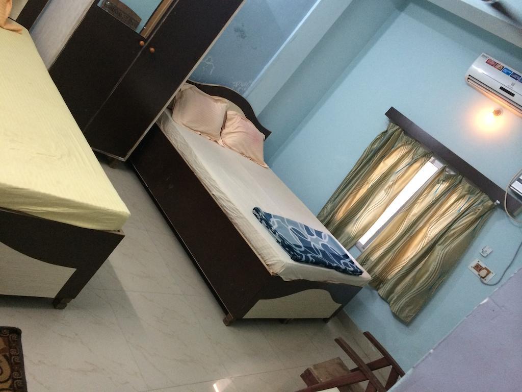 Hotel Pragya International Varanasi Oda fotoğraf